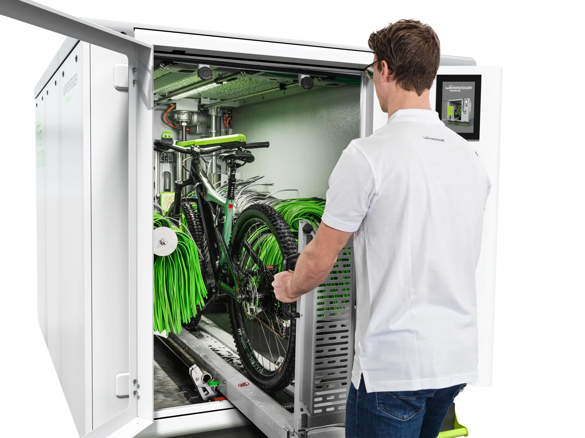 TrailWash automated bike washing station in use